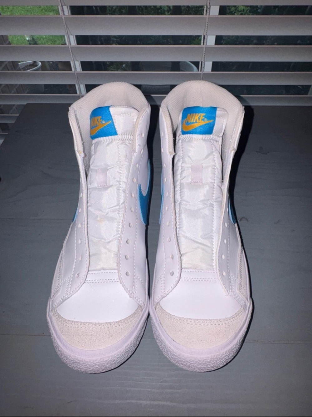Nike White High-Top Blazers with Blue Swoosh and Yellow Tongue Logo